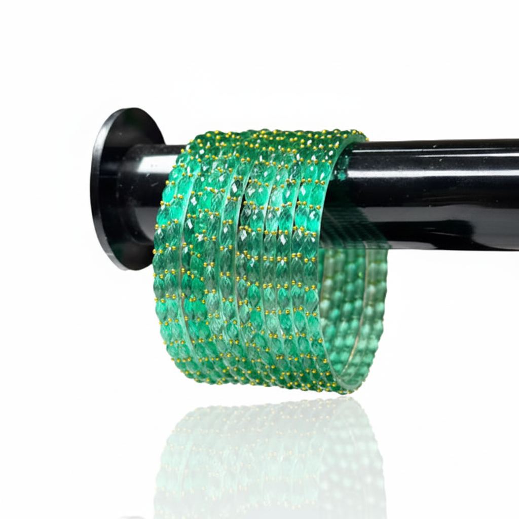 Seafoam green bangles on white background