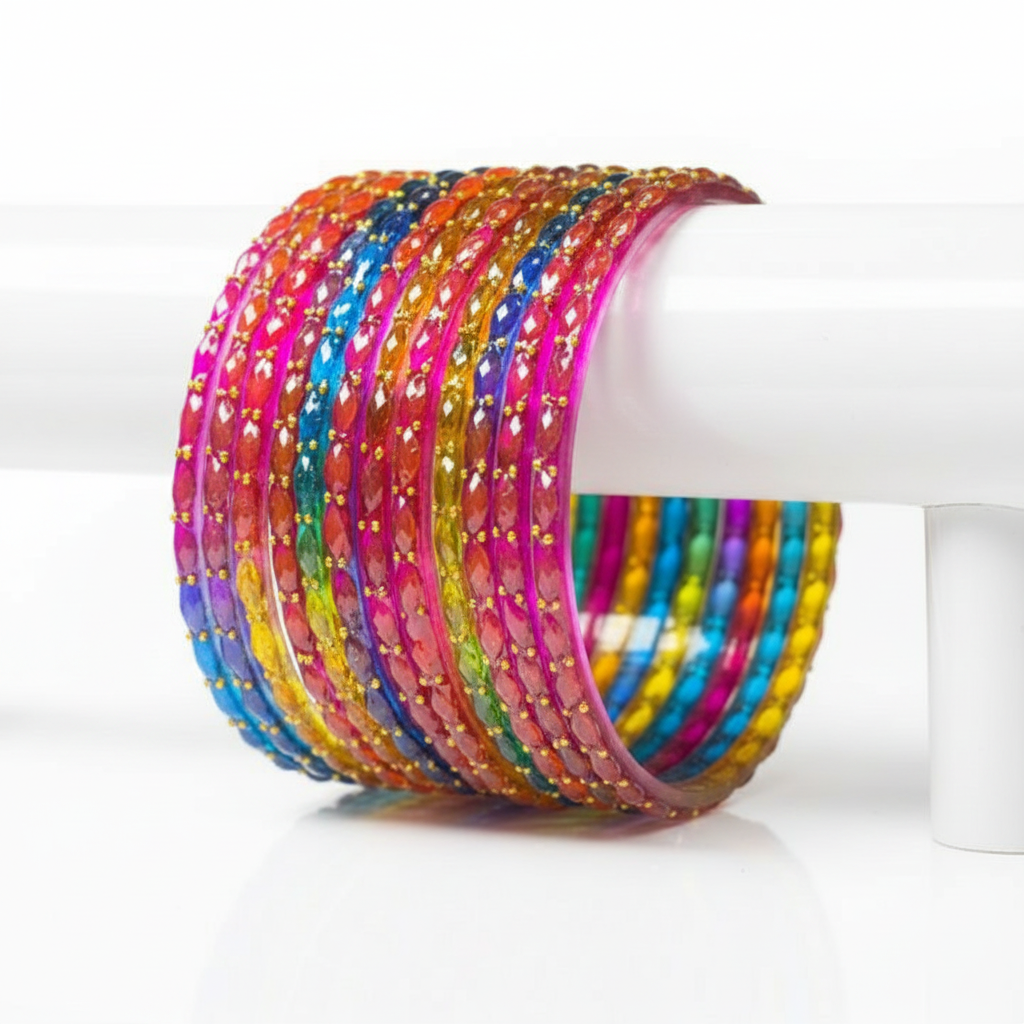 Multicolor glitter bangles on white background