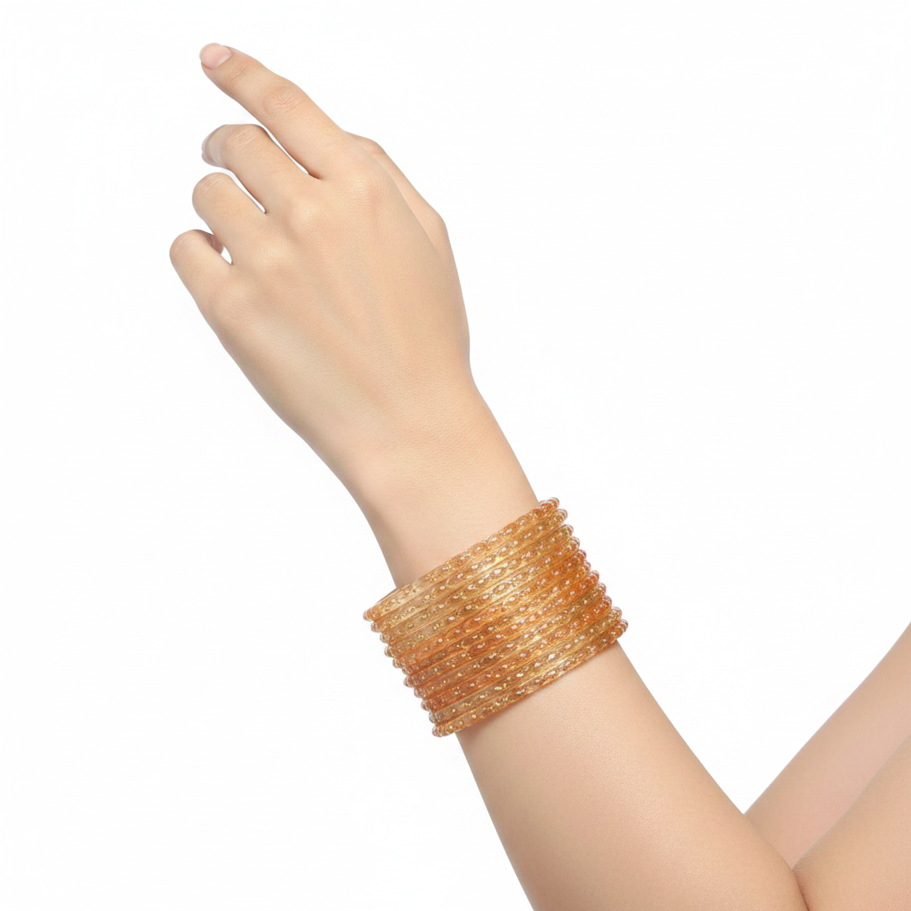 Peach raindrop glass bangles on wrist