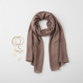 Brown plain modal scarf flat lay with gold bangles