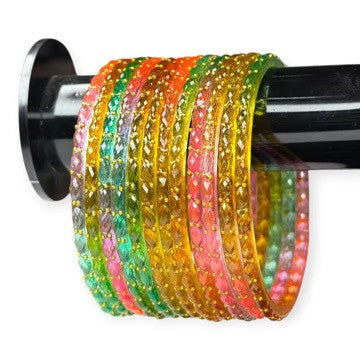 Pastel multicolor raindrop bangles stacked on a display rod